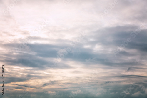 Beautiful blue dramatic sky with clouds at sunrise. Background. Space for text. © Анна Демидова