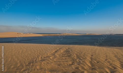 Panorama of the desert of Qatar leading to the inland sea..