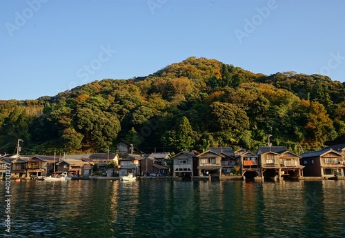 View of Funaya, boat houses, with beautiful sun light at Ine bay in Autumn , Ine city, Kyoto, Japan - 京都 伊根の舟屋 秋の景色