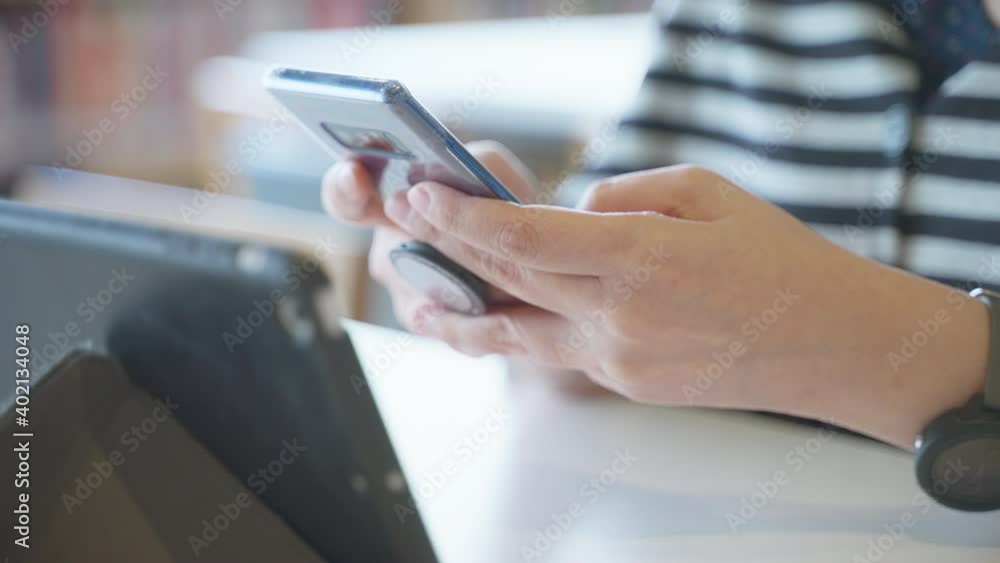Female hands holding and using phone to connect online, technology or online business concept Female hands holding and using phone to connect online, technology or online business concept