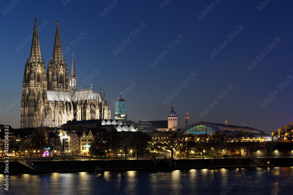 cityview cologne with cathedral and central station at dusk
