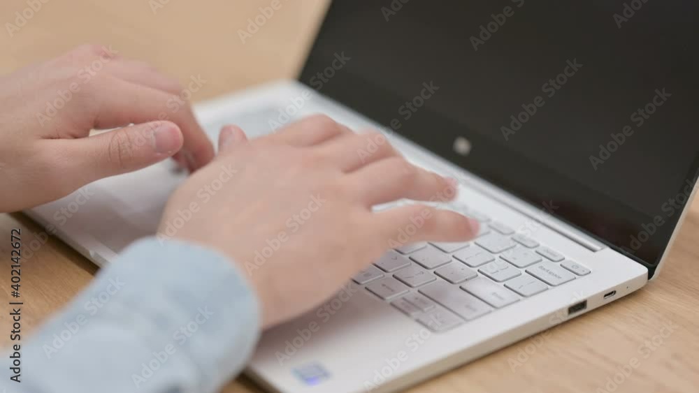Close up of Hands of Man Typing on Laptop Close up of Hands of Man Typing on Laptop
