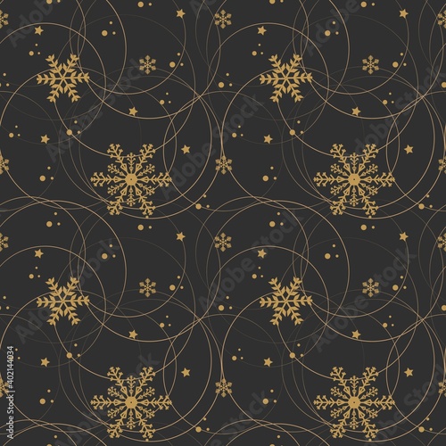 Seamless pattern. Golden crystal snowflakes on a dark background. For fabric  textile  wrapping paper  invitation  wallpaper and design.Vector illustration