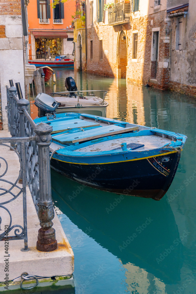 venice city canal and boat