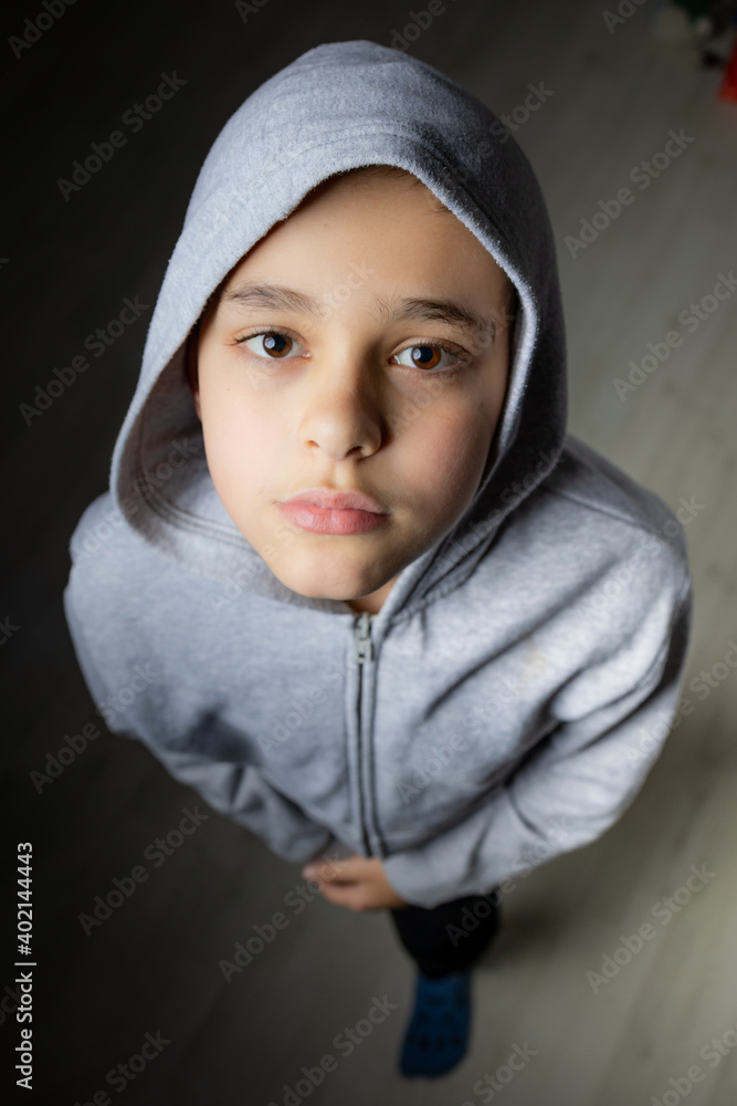 Portrait of happy little cool boy wearing hooded sweatshirt. Portrait of happy little cool boy wearing hooded sweatshirt.