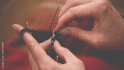 Woman hands close up knitting