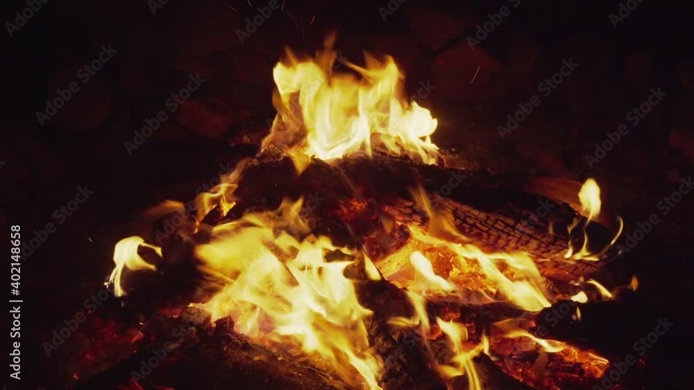 Campfire flames with big logs. Static shot Campfire flames with big logs. Static shot