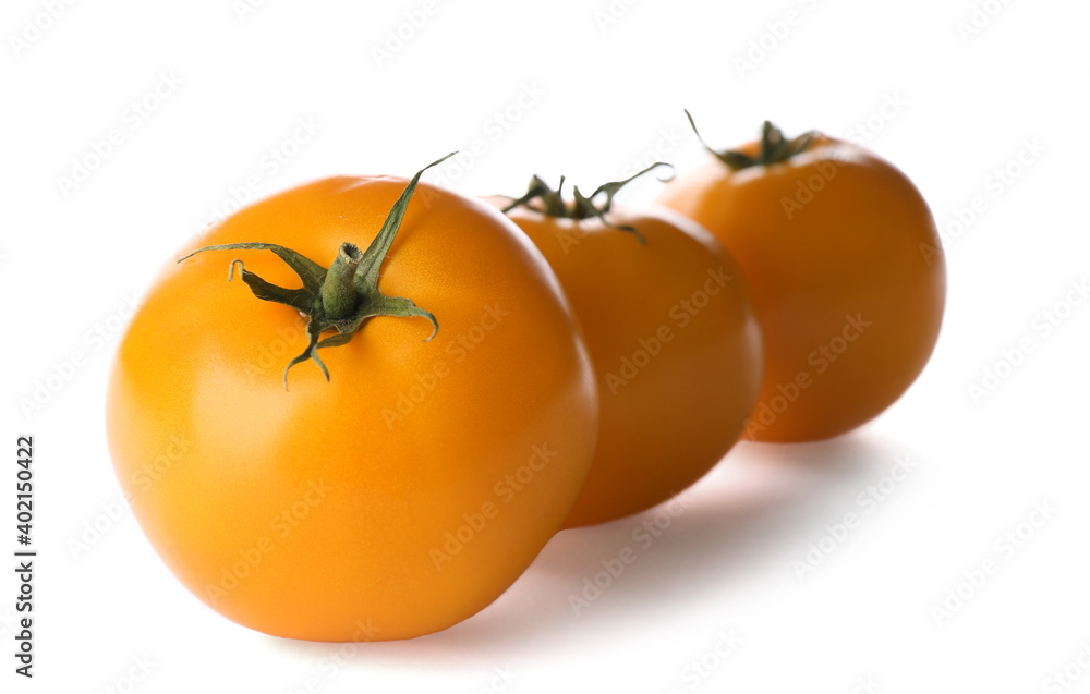 Delicious ripe yellow tomatoes isolated on white Delicious ripe yellow tomatoes isolated on white