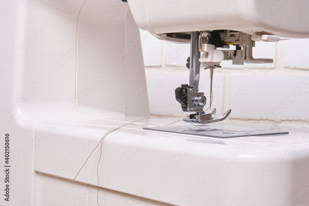 Detail of sewing machine and sewing accessories.