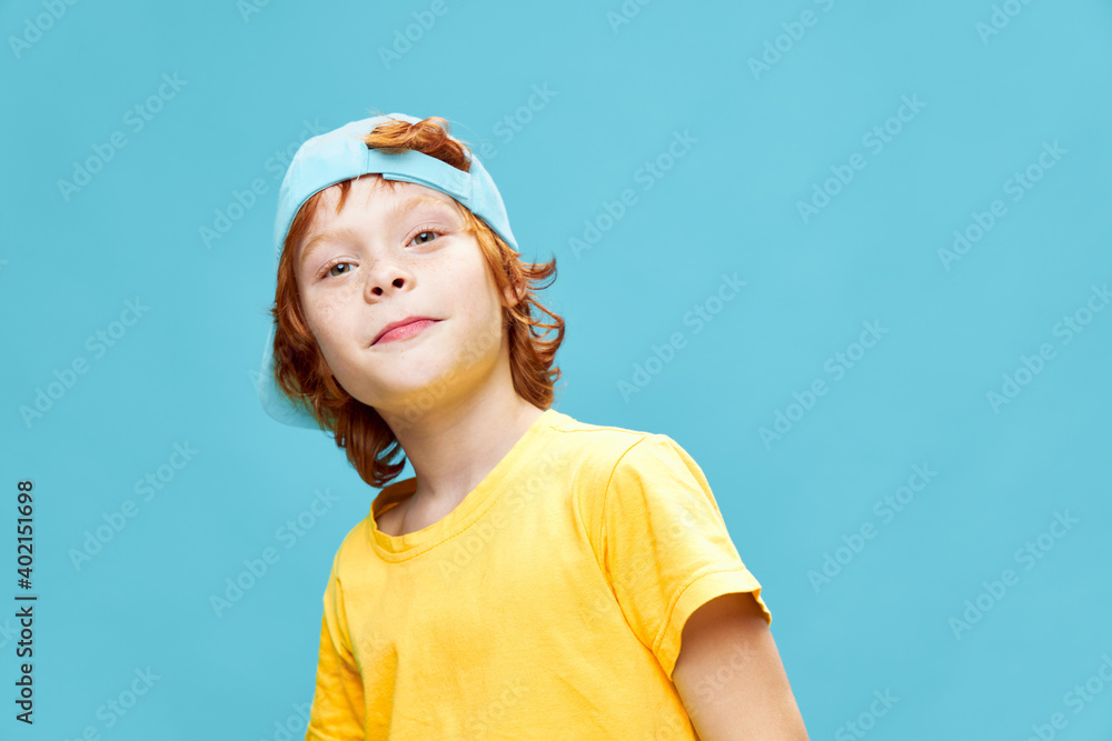 redhead boy yellow t shirts blue cap fashion clothes 