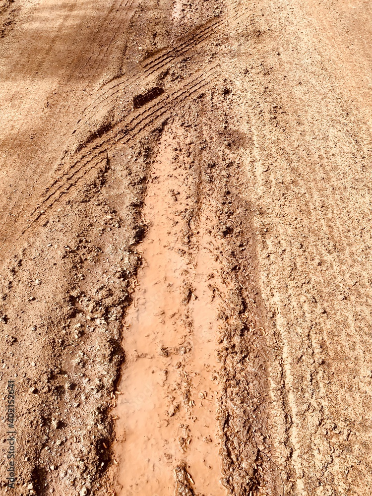 Muddy bumpy path in detail. Impassable road Muddy bumpy path in detail. Impassable road
