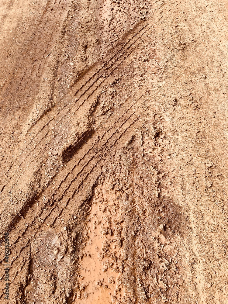 Muddy bumpy path in detail. Impassable road Muddy bumpy path in detail. Impassable road
