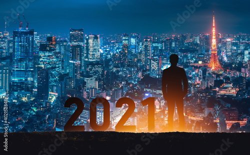 Canvas Print New year 2021 business man on future network night city