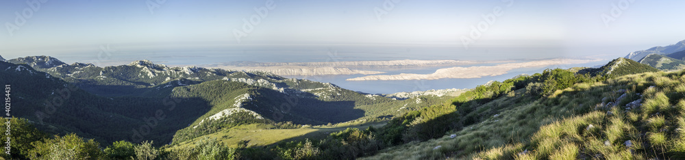 Panoramatic view on mountains after sunrise in croatian national park Velebit.