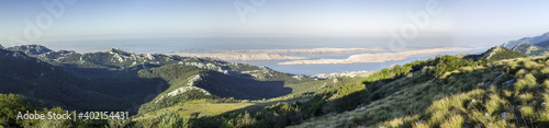 Panoramatic view on mountains after sunrise in croatian national park Velebit.