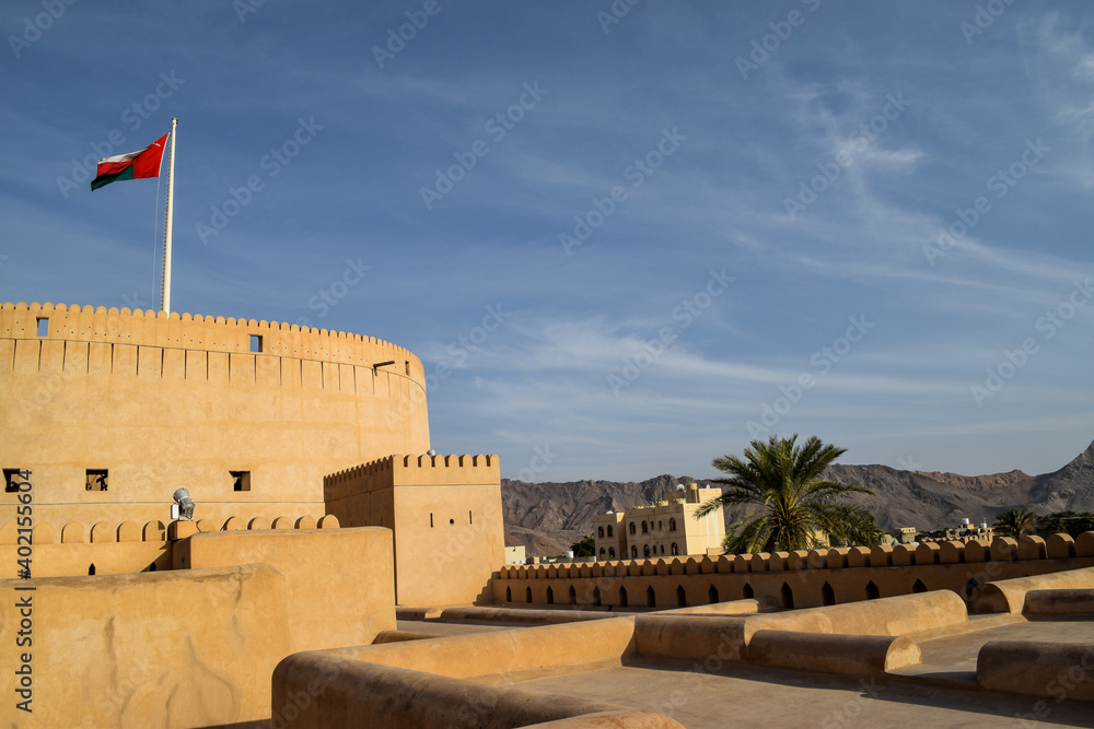 Nizwa Fort's main tower in contrast with the blue sky. Nizwa, Oman.