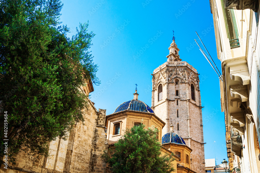 Valencia, Spain - 07.21.2019: El Miguelete, Miguelete Bell Tower is the Valencian Gothic style bell tower of Valencia Cathedral. It is 50.85 metres high and was built between 1381 and 1424. 