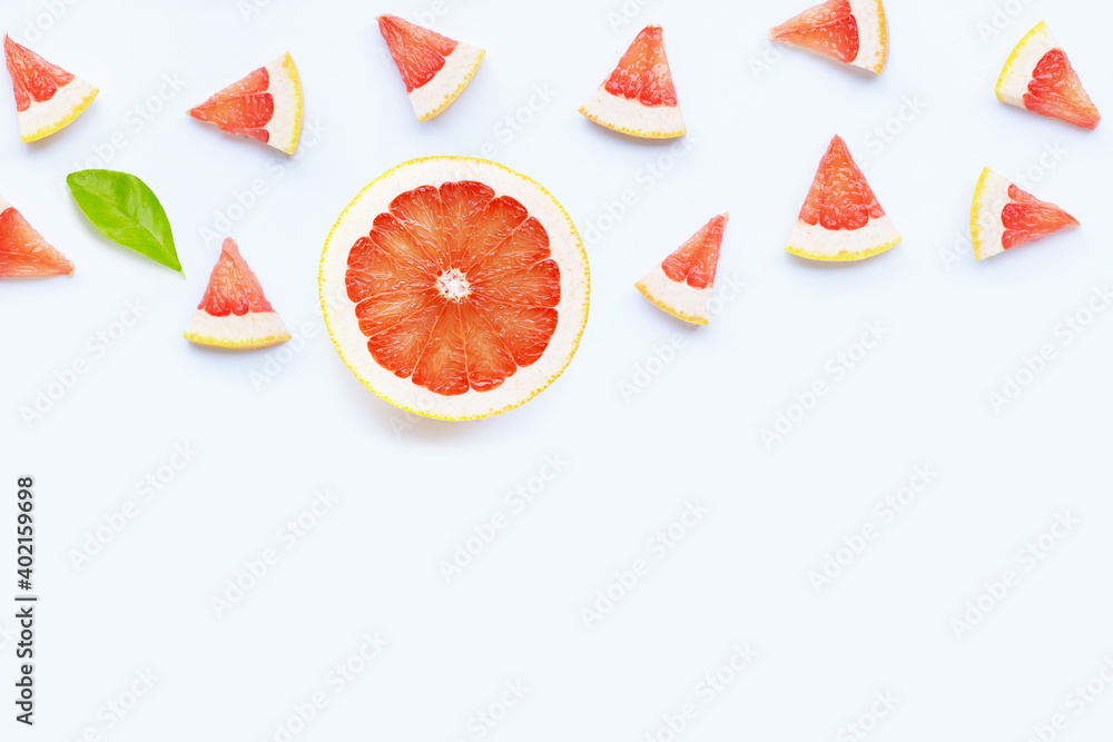 High vitamin C. Juicy grapefruit slices on white. High vitamin C. Juicy grapefruit slices on white.