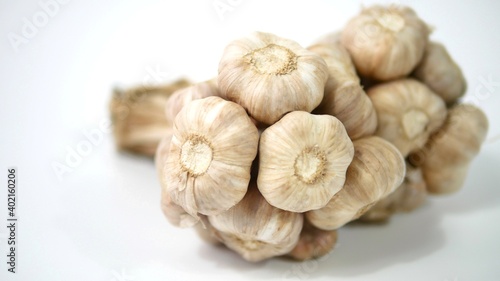 A bunch of fresh garlic isolated on white background