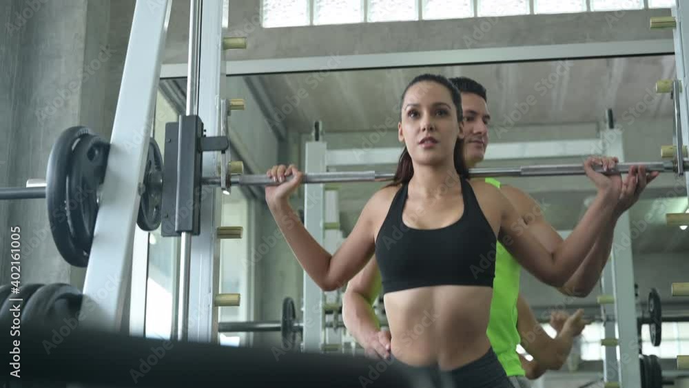 athletic woman exercise with trainer at fitness gym, sport healthy and workout lifestyle athletic woman exercise with trainer at fitness gym, sport healthy and workout lifestyle