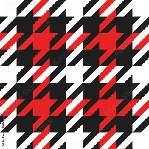 Goose foot. Christmas Pattern of crow is feet in red and black cage. Glen plaid. Houndstooth tartan tweed. Dogs tooth. Scottish checkered background. Seamless fabric texture. Vector illustration