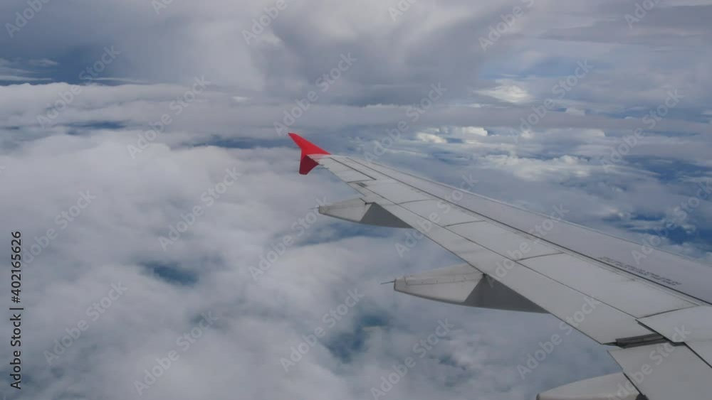 Sky from airplane with wing fly over cloud Sky from airplane with wing fly over cloud
