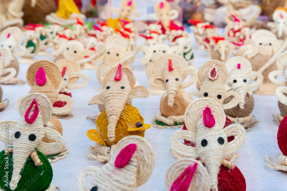 Lord Ganesha dolls made from jute, Handicrafts for sale at Kolkata handicrafts fair, West Bengal, India.