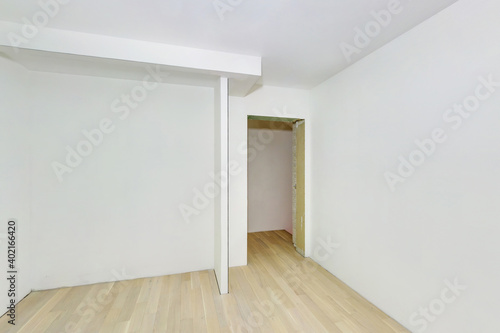 Empty unfurnished room with minimal preparatory repairs. interior with white walls