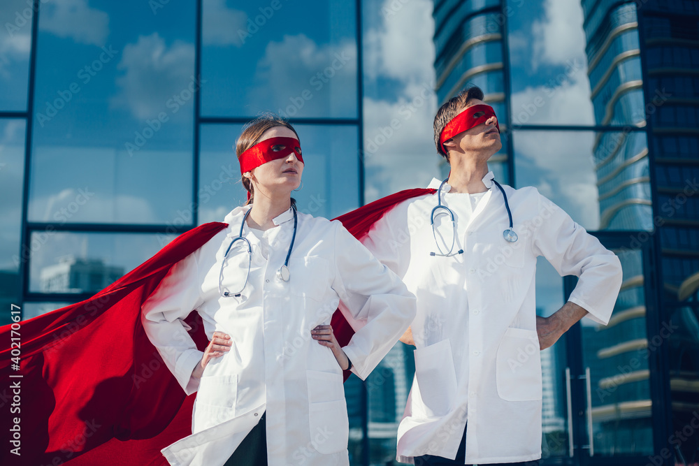 close up. doctors are superheroes standing on a city street .