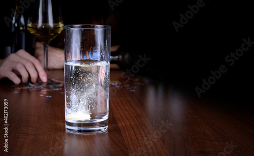 Canvas Print Glass with effervescent tablet on a dark background stock images