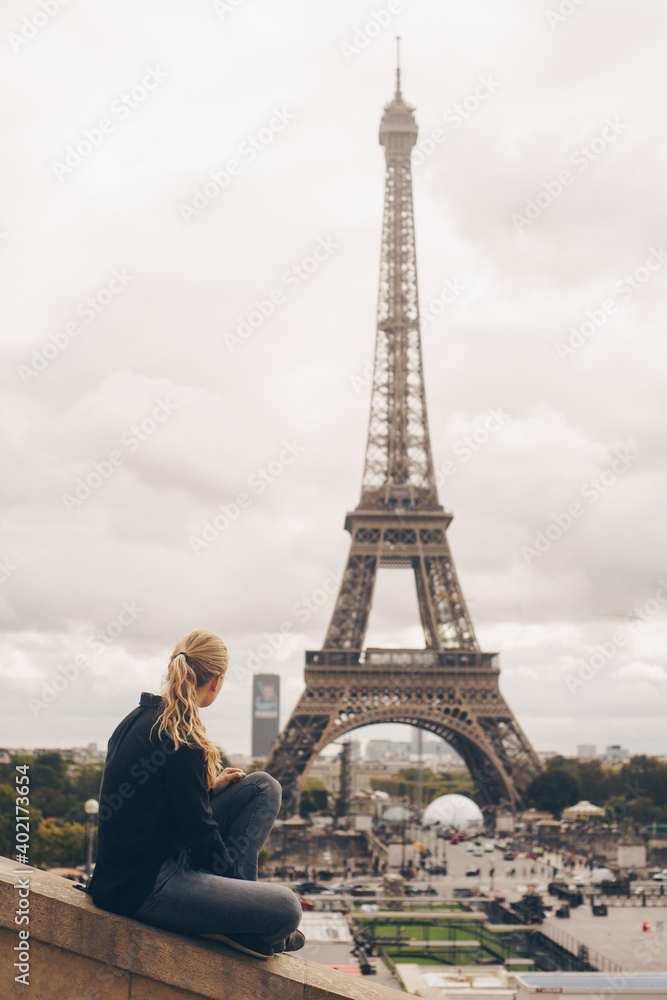 Woman in front of Eiffel Tower