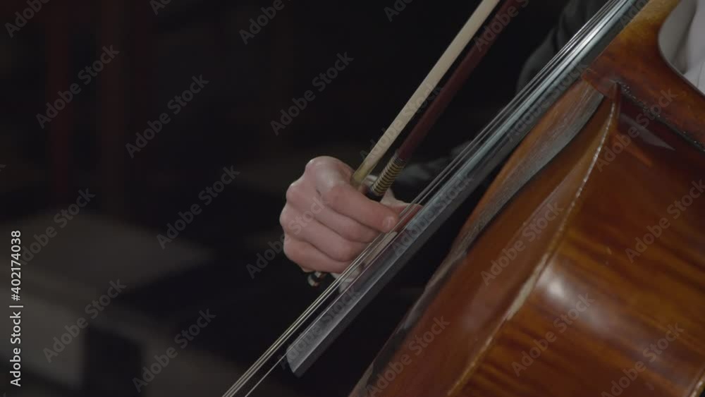 Close Up Male Cellist Plucking Strings Close Up Male Cellist Plucking Strings