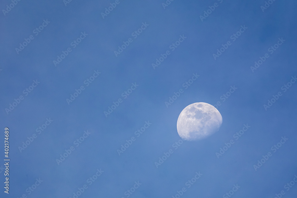 The moon on the blue sky in thailand The moon on the blue sky in thailand
