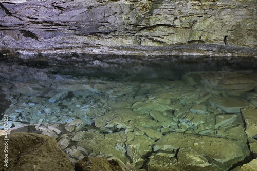 Fototapeta Naklejka Na Ścianę i Meble -  Underground lake in Kungur Ice Cave. Perm Krai. Russia