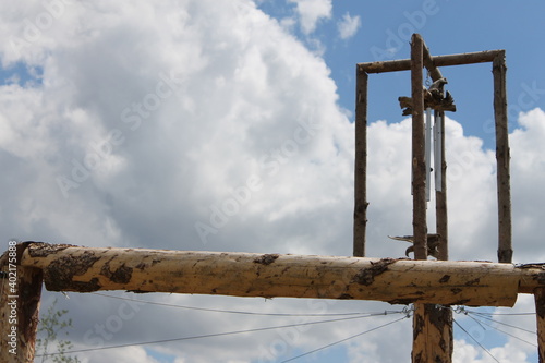 sky, cross, construction, blue, crane, religion, wood, wooden, clouds, symbol, industry, sign, building, faith, old, pole, tower, christ, power, architecture, equipment, cloud, church