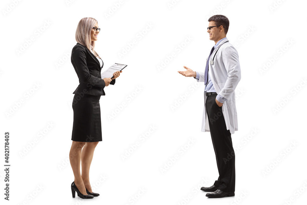 Full length profile shot of professional woman and a male doctor having a conversation