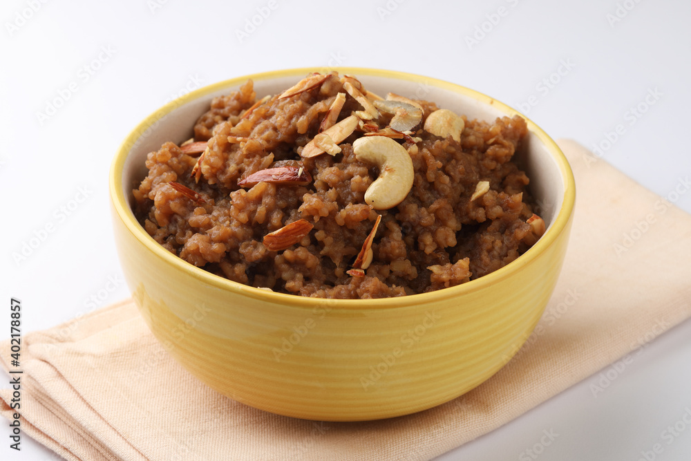 South Indian Sweet pongal made from rice, milk, jaggery and dry fruits.coconutsweet pongal South Indian Sweet pongal made from rice, milk, jaggery and dry fruits.coconutsweet pongal