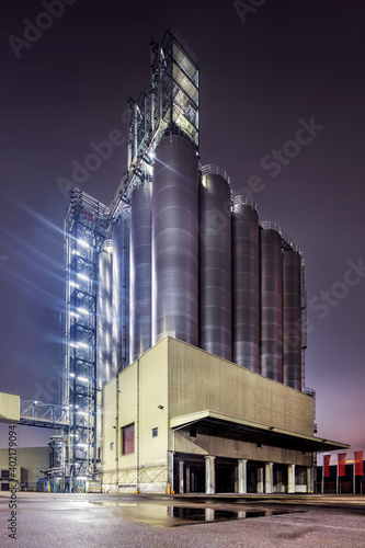 Illuminated installation petrochemical production plant at night, Port of Antwerp, Belgium.