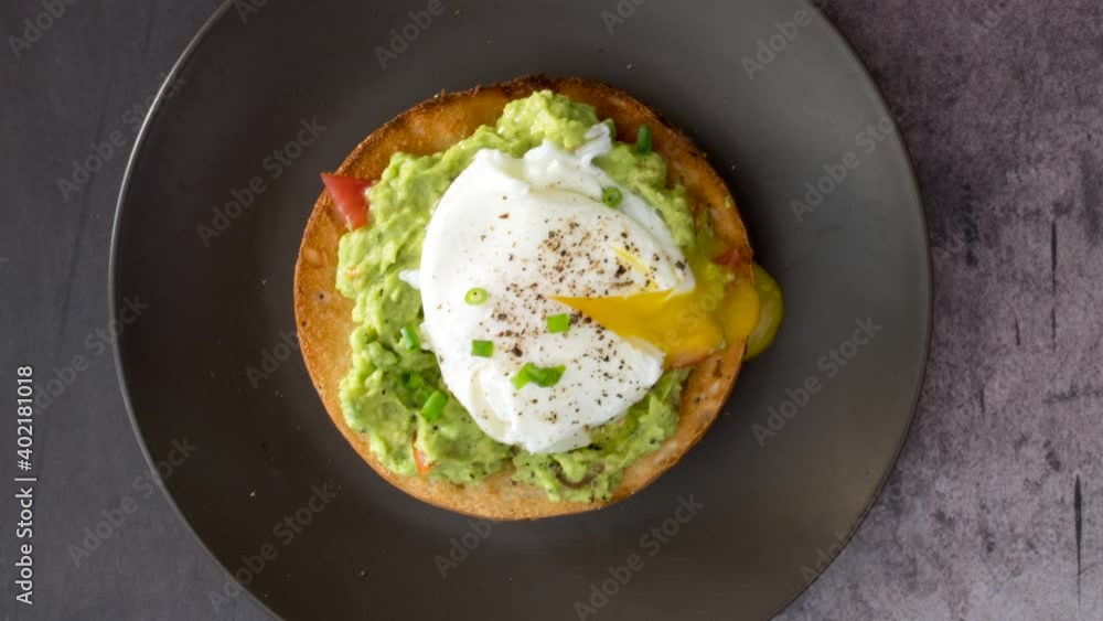 Rotating Avocado Bagel with a Fried Egg Rotating Avocado Bagel with a Fried Egg