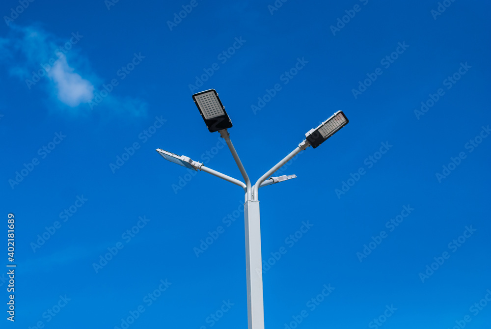 Solar cells lights against blue sky 