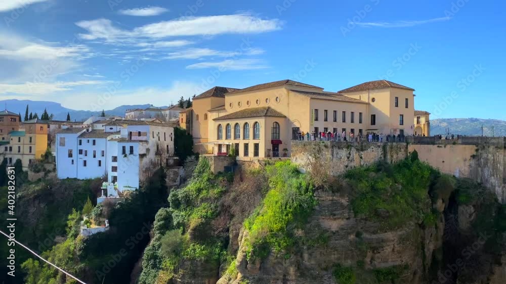 Beautiful blue sky and city view on historical Puente Nuevo bridge in Ronda Spain, 4K panning right Beautiful blue sky and city view on historical Puente Nuevo bridge in Ronda Spain, 4K panning right
