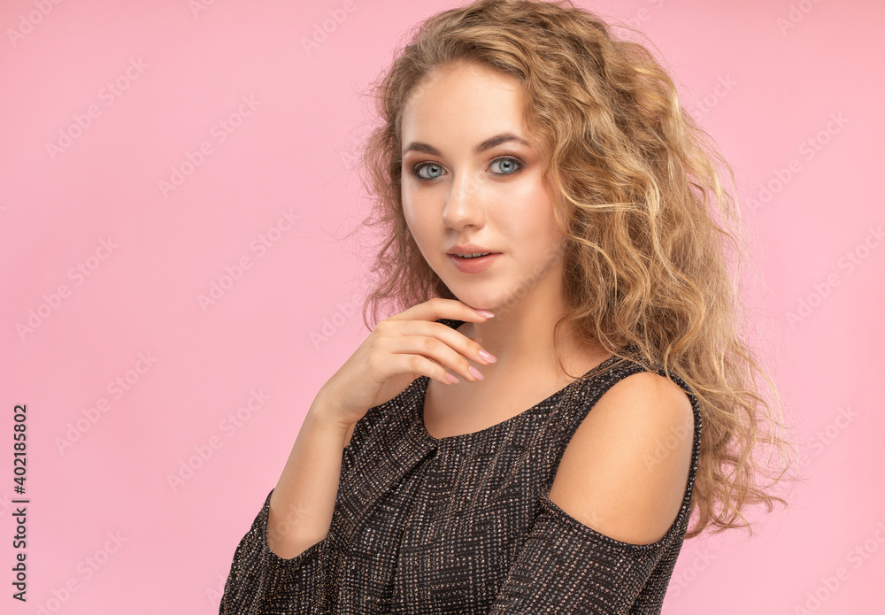 Beautiful red-haired girl with beautiful makeup, with clean skin, long hair in black dress. Beautiful red-haired girl with beautiful makeup, with clean skin, long hair in black dress.