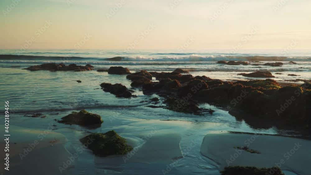 Waves crushing in a beach shore in the sunset. Waves crushing in a beach shore in the sunset.