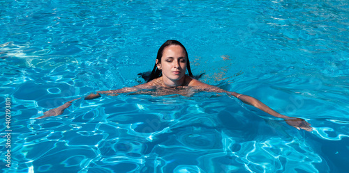 Nude woman in swimming pool © misu