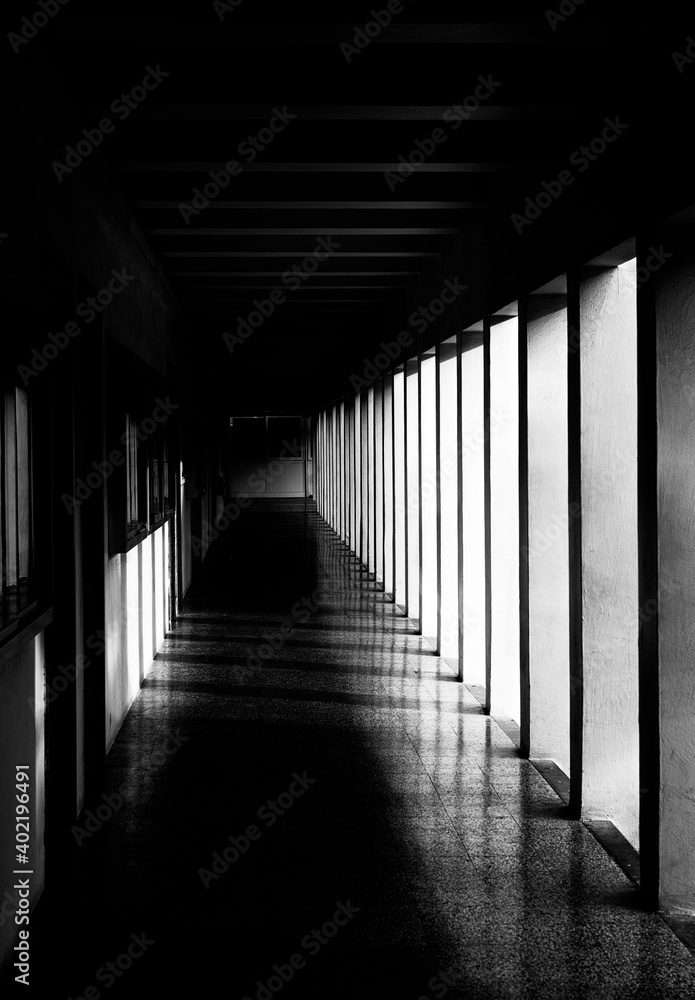 Corridor with columns in grunge tonality photo, abstract architectural photo, desaturated photo, columns, diagonal, street photography. Architectural details Corridor with columns in grunge tonality photo, abstract architectural photo, desaturated photo, columns, diagonal, street photography. Architectural details