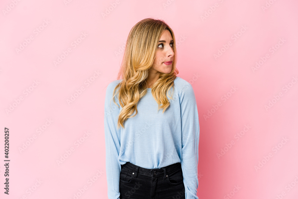 Young caucasian blonde woman being shocked because of something Young caucasian blonde woman being shocked because of something