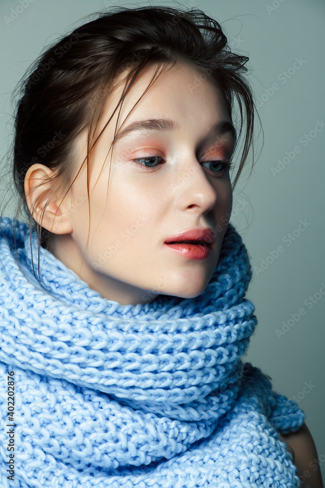 beauty young blond woman in scarf with weathered lips close up, dehydrated winter skin cosmetic concept beauty young blond woman in scarf with weathered lips close up, dehydrated winter skin cosmetic concept