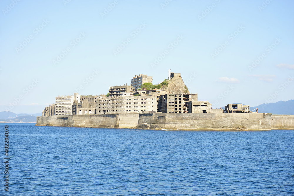 View of Gunkanjima or Battleship island, Ghost Island, from ferry boat in Nagasaki, Japan - 長崎 軍艦島 View of Gunkanjima or Battleship island, Ghost Island, from ferry boat in Nagasaki, Japan - 長崎 軍艦島