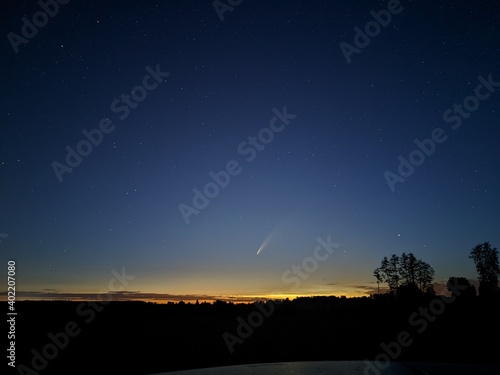 Comet and sunset
