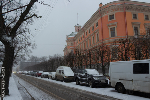 Sadovaya street and a view of the Mikhailovsky castle in St. Petersburg, snowy and traditionally gloomy December. Winter in St. Petersburg in Russia